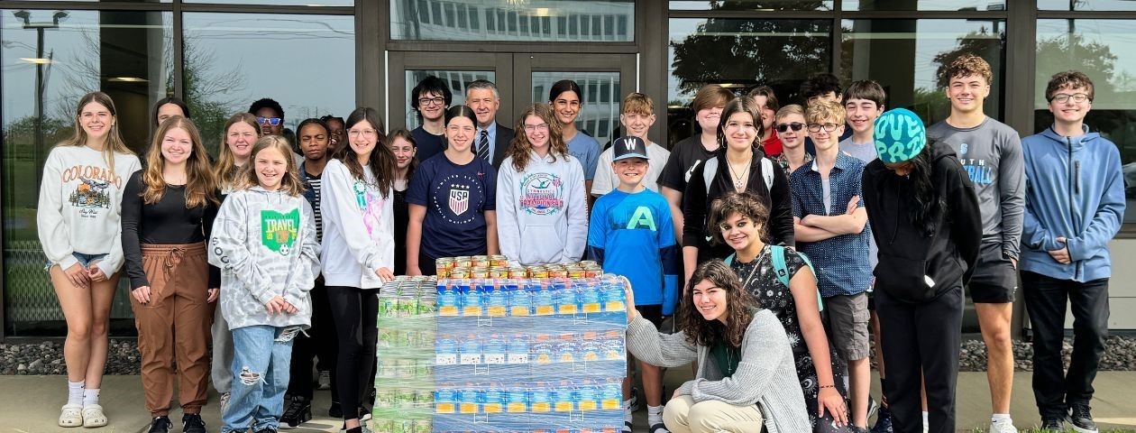 Student Advisory Council with food they collected for End 689 Hours of Hunger